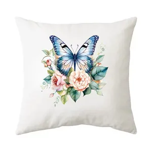 Heat transfer pattern of butterfly and flowers displayed on a white square throw pillow