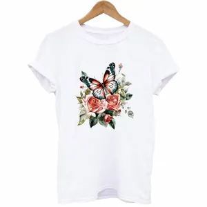 White T-shirt with vintage butterfly and rose floral heat transfer print on hanger
