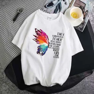 White short-sleeve T-shirt featuring a colorful butterfly wing and motivational text