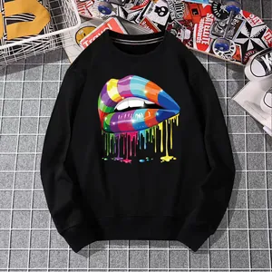 Black crewneck sweatshirt featuring a vibrant rainbow dripping lips heat transfer design