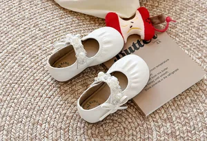 Élégantes chaussures Mary Jane blanches pour filles avec bride en perles et nœud