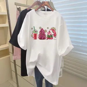 Detailed view of a pink Christmas tree heat transfer decal applied to a white T-shirt