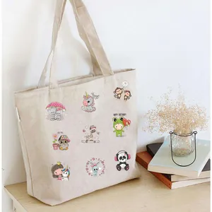 Lot de patchs thermocollants de dessins animés pour vêtements et sacs d'enfants.