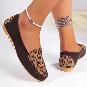 Detailed view of women's brown leopard print loafers with comfortable memory foam sole.