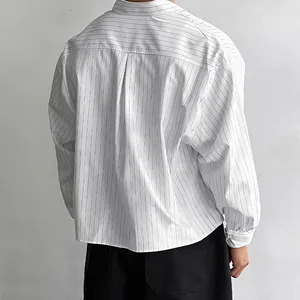 Back view of a minimalist white loose-fit long-sleeve striped shirt for men's fashion