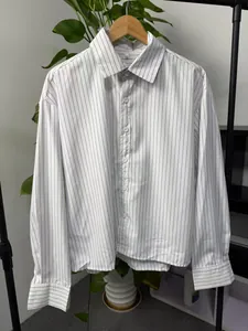 Classic men's loose fit long-sleeve shirt featuring vertical black stripes on white fabric