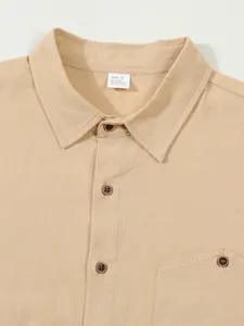 Detailed close-up view of beige men's linen-blend shirt collar and retro button texture