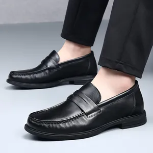 Men's black genuine leather penny loafers with soft sole and handmade stitching.