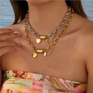 Punk style stainless steel chunky chain necklace with heart and tag charms on model