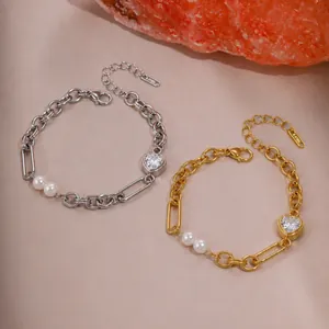 Close-up detail of stainless steel heart bracelets with zircon crystals and white pearls