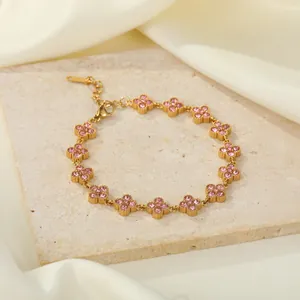 Elegantes goldbeschichtetes Edelstahlarmband mit rosa Zirkonia-besetzten Kleeblatt-Motiven