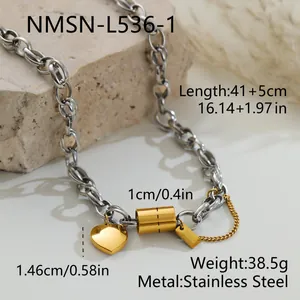 Detail view of chunky stainless steel heart necklace with technical measurement annotations.