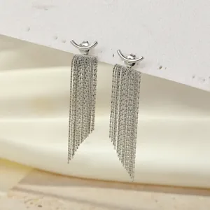 Detailed view of stainless steel arc earrings with multi-layer snake chain tassels.