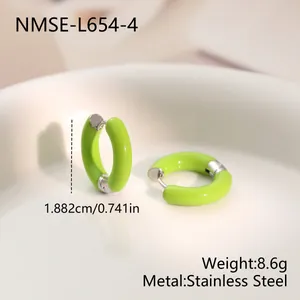 Close-up detail of lime green enamel C-shaped stainless steel hoop earrings set