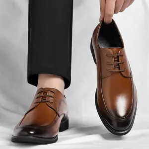 Professional brown leather dress shoes with gradient toe for men's business wear.