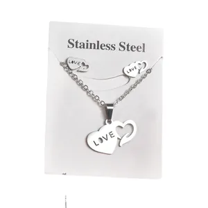 Silver stainless steel double heart necklace and earring set with LOVE engraving design