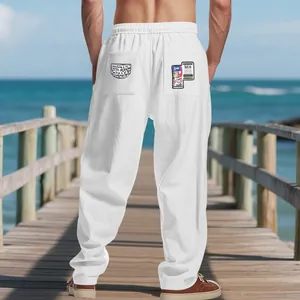 Vue arrière du pantalon de plage en lin blanc pour homme avec poches graphiques.