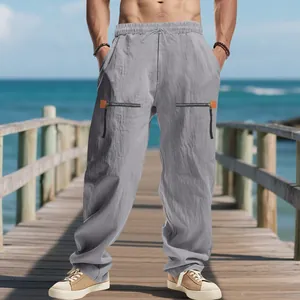 Pantalon de plage en lin ample pour hommes avec fermetures éclair et cordon de serrage.