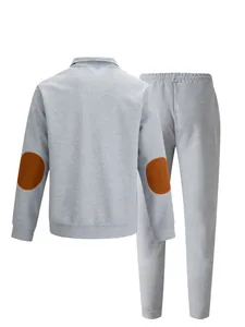 Back view of gray waffle knit men's tracksuit set with contrast brown elbow patches