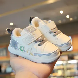 White soft sole baby walking shoes with anti-slip design and cute patches
