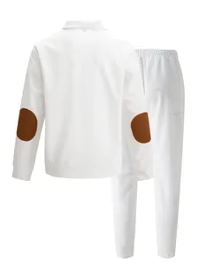 Back view of white waffle knit tracksuit for men featuring stylish brown elbow patches