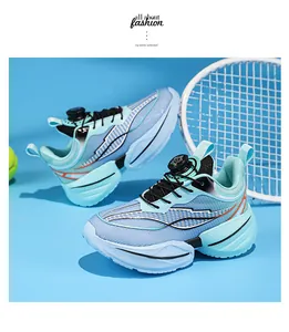 Detailed macro view of light blue boys' running shoes featuring a rotary buckle system