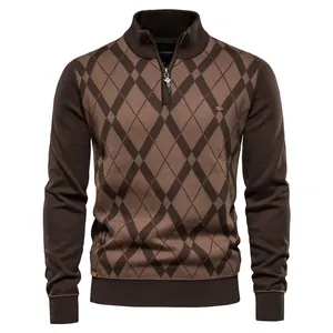 Close-up detail of a stylish brown men's argyle knit sweater with half-zip stand collar