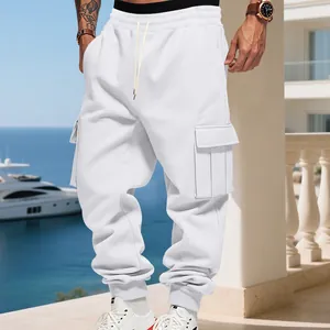 Detailed view of white fleece cargo sweatpants with multi-pockets and drawstring waist