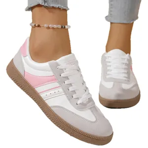 Vintage women's German Army Trainers in white and pink leather with retro gum sole and laces