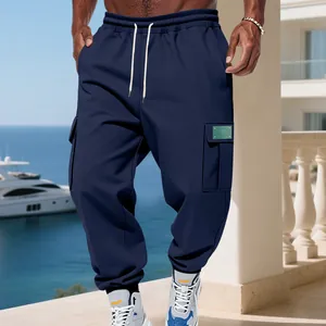 Detail view of men's heavy fleece cargo joggers featuring multi-pockets and drawstring waist