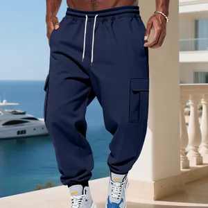 Men's navy blue fleece-lined cargo pants with drawstring waist and side pockets