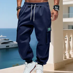 Men's heavy fleece cargo sweatpants in navy blue with loose fit and multiple pockets.
