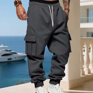 Detailed view of grey heavy fleece cargo sweatpants with large side pockets for men