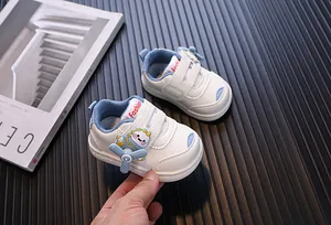 Close-up of cute cartoon baby walking shoes with rotating propeller for toddlers