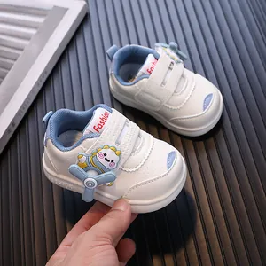 White and blue baby walking shoes with cute rotating propeller and cartoon character