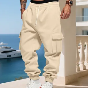 Detail of men's beige fleece cargo sweatpants with multi-pockets and drawstring waist