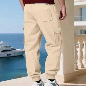 Rear view of men's beige heavyweight fleece cargo sweatpants with functional side pockets