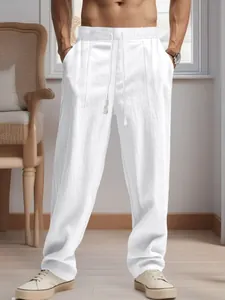 Detailed view of high-quality white linen loose straight pants for men shown on model