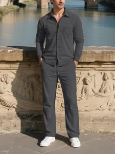 Detail of dark grey corduroy men's shirt and pants set in casual outdoor setting