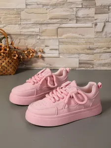 Sneakers platform rosa da donna con lacci a corda e suole spesse stile casual