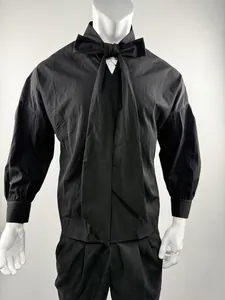 Detail shot of a black drop-shoulder shirt featuring a unique oversized bow collar.
