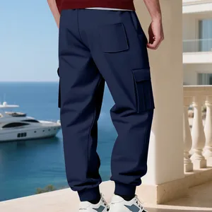 Detail view of navy blue heavyweight fleece-lined men's cargo sweatpants with pockets.