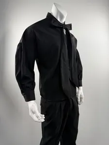 Men's loose drop-shoulder black shirt featuring a unique oversized bow tie detail