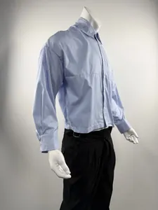 Close-up side view of a blue and white striped long sleeve shirt on a mannequin.