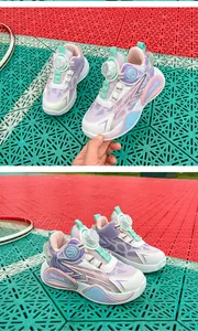Detailed view of kids purple and teal breathable mesh basketball shoes with rotary buckle