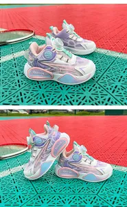 Close-up of kids' mesh basketball shoes featuring a convenient rotating buckle system