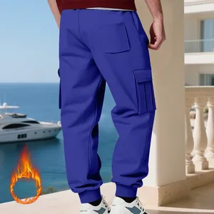 Back view of premium blue men's fleece cargo sweatpants with large side pockets