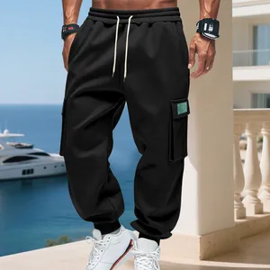 Men's loose heavy black cargo sweatpants with fleece lining and functional pockets