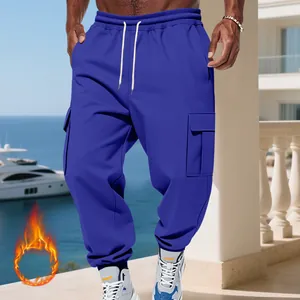 Detailed view of blue heavy fleece-lined men's cargo pants with multi-pockets
