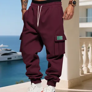 Close-up of men's burgundy heavy fleece cargo sweatpants with large side pockets